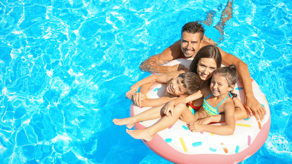 Family together showing the importance of pool safety by utilizing pool float.