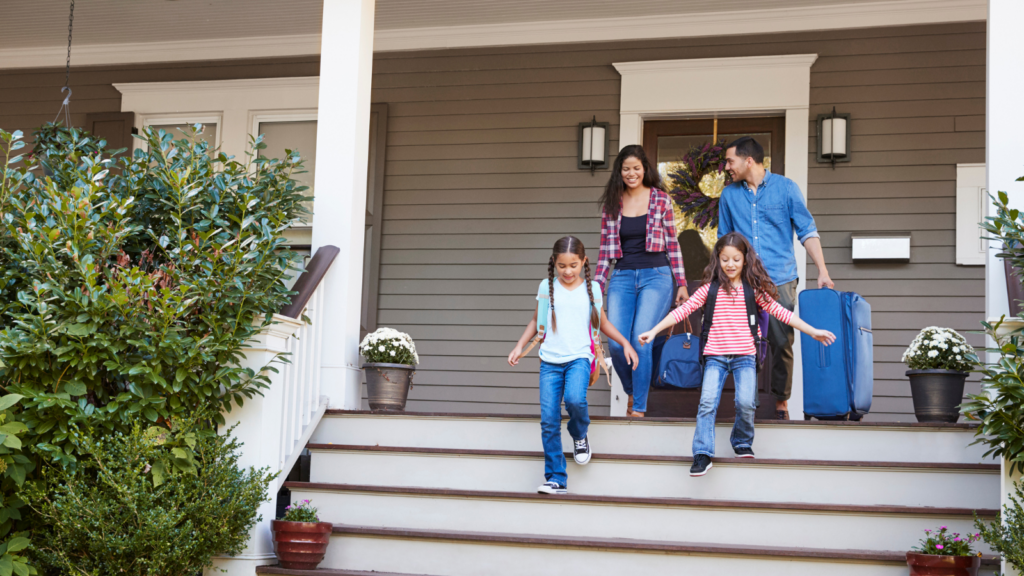 Family conveys excitement to leave home for vacation showing the importance of securing the home.